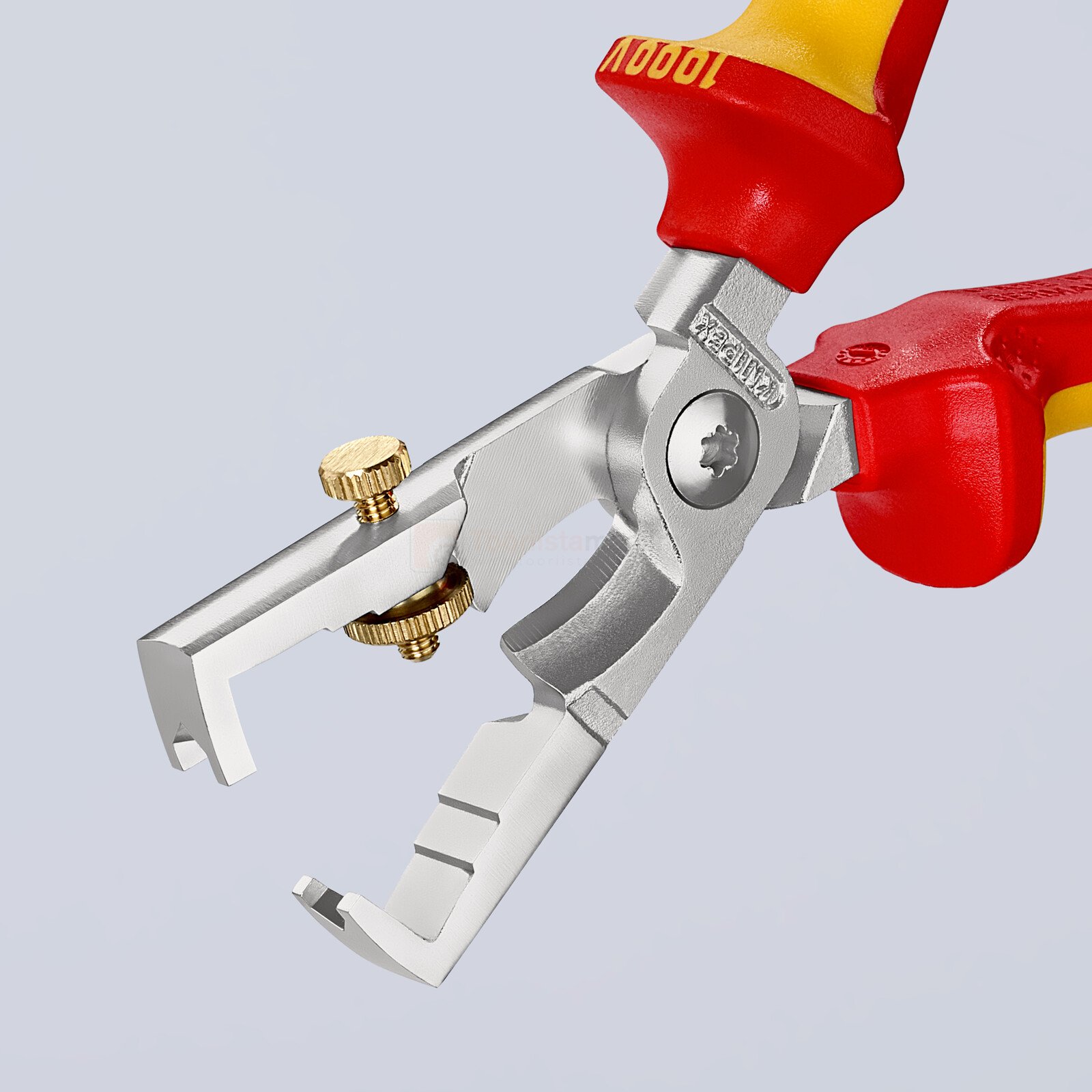 Pildil on näha KNIPEX StriX® isolatsiooni koorijad, millel on kaablikäärid, mis on suunatud kaablite isolatsiooni...