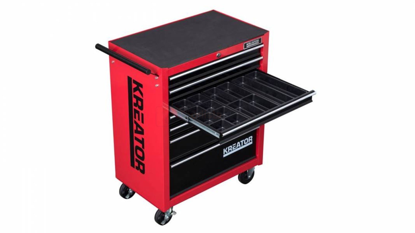 Pildil on punane Kreator tööriistakomplekt, millel on avatud sahtel ja mis on varustatud ratastega.