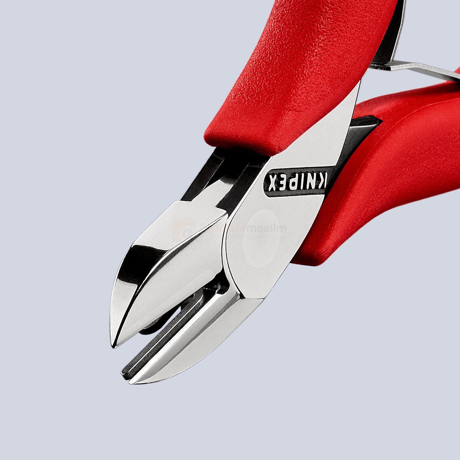 Pildil on näha Knipex karpliigendiga külglõiketangid, millel on punased käepidemed ja teravad lõiketerad.
