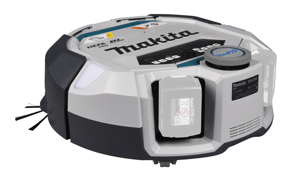 Pildil on Makita robottolmuimeja DRC300Z, millel on näha brändi nimi, aku sisestamise koht, HEPA filter ja peamised nupud.