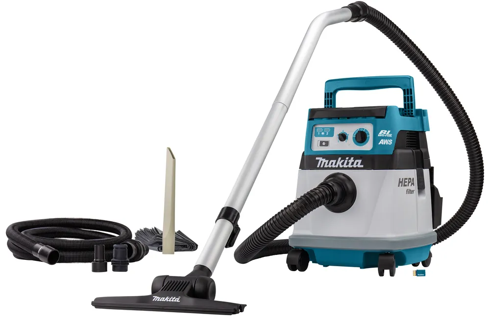 Pildil on Makita akutolmuimeja DVC157LZX3, koos vooliku, otsikute ja lisatarvikutega.