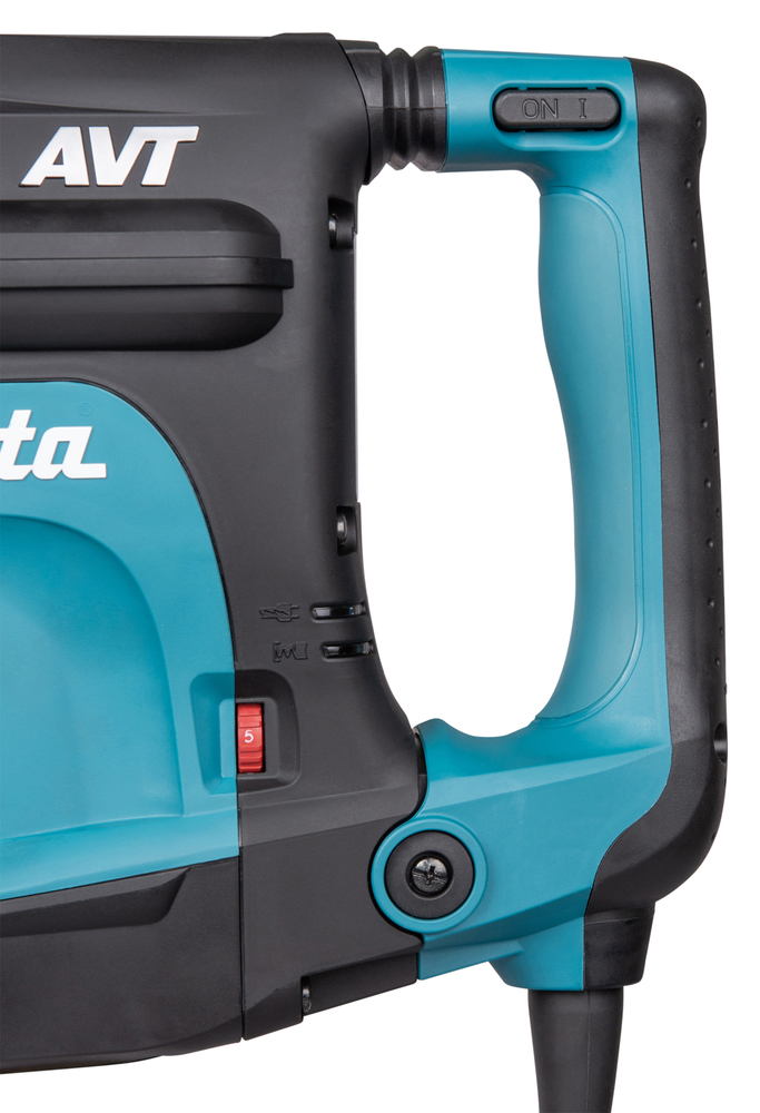 Pildil on detailne vaade Makita piikvasarile HM1213C SDS-MAX, millel on näha tööriista korpus, käepide ja reguleerimisnupud.