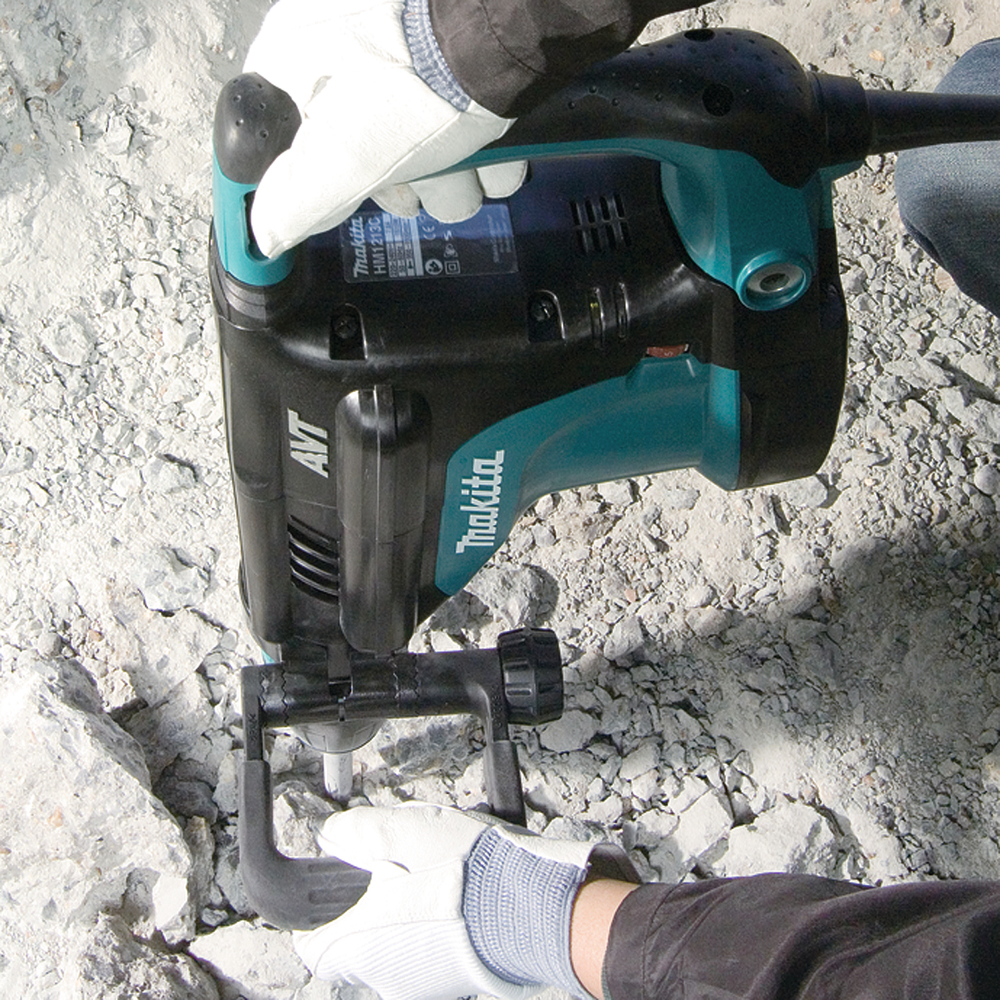 Pildil on näha Makita piikvasar HM1213C SDS-MAX, mida kasutatakse kivi lõhkumiseks.