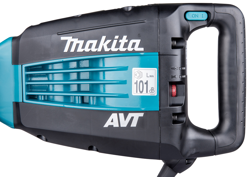 Pildil on Makita HM1214C piikvasar, millel on sinine korpus, ventilatsioonivõre, sisse/välja nupp ja reguleeritav kiirus.