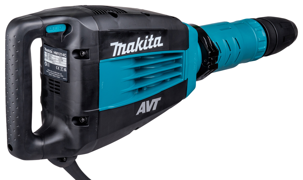 Pildil on musta-sinine Makita piikvasar HM1214C, millel on roheline lüliti ja ventilatsiooniavad, mis on suunatud kaamera...