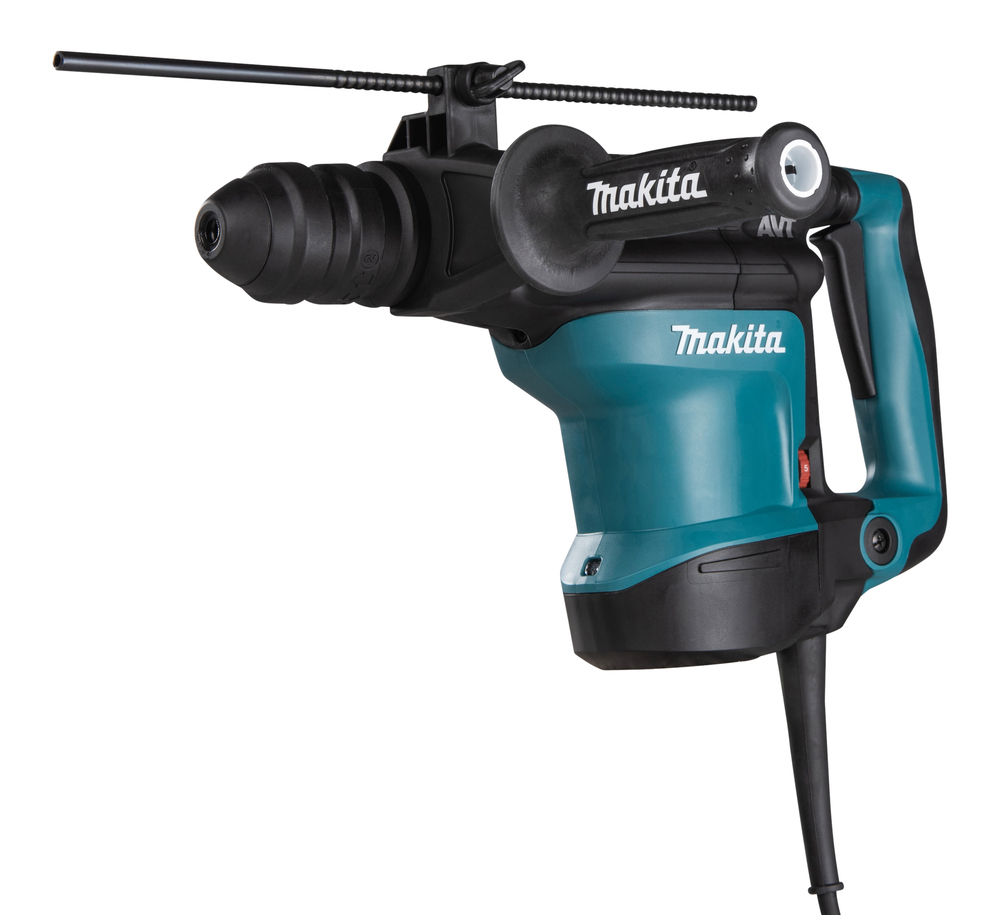 Pildil on Makita HR3210FCT puurvasar, millel on küljel käepide, pea ees ja tööriista küljes on ka küljevarras.