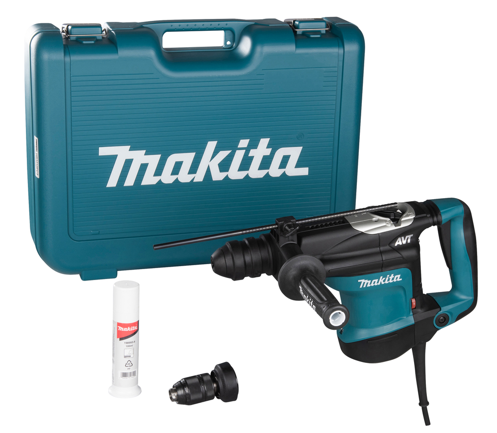 Pildil on Makita puurvasar HR3210FCT koos kohvriga, määrdeainega ja puuripeaga.