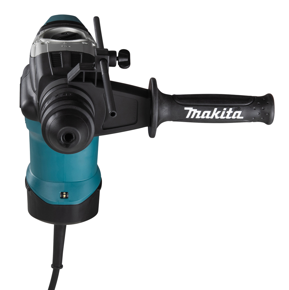 Pildil on Makita puurvasar HR3210FCT, millel on küljel käepide ja reguleeritav sügavuspiiraja.