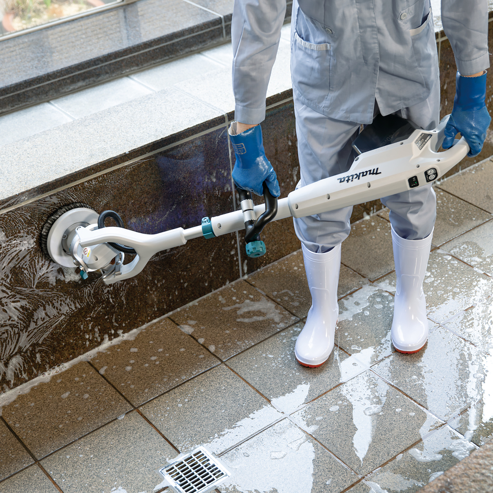 Makita cordless floor care machine PS001GZ, without battery and charger