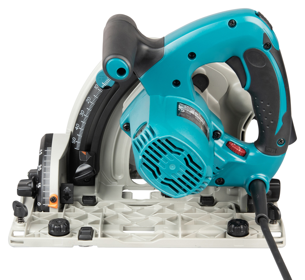 Pildil on Makita SP6000J ketassaag, millega on näha sae sinine korpus, sae ketas ja juhikud.