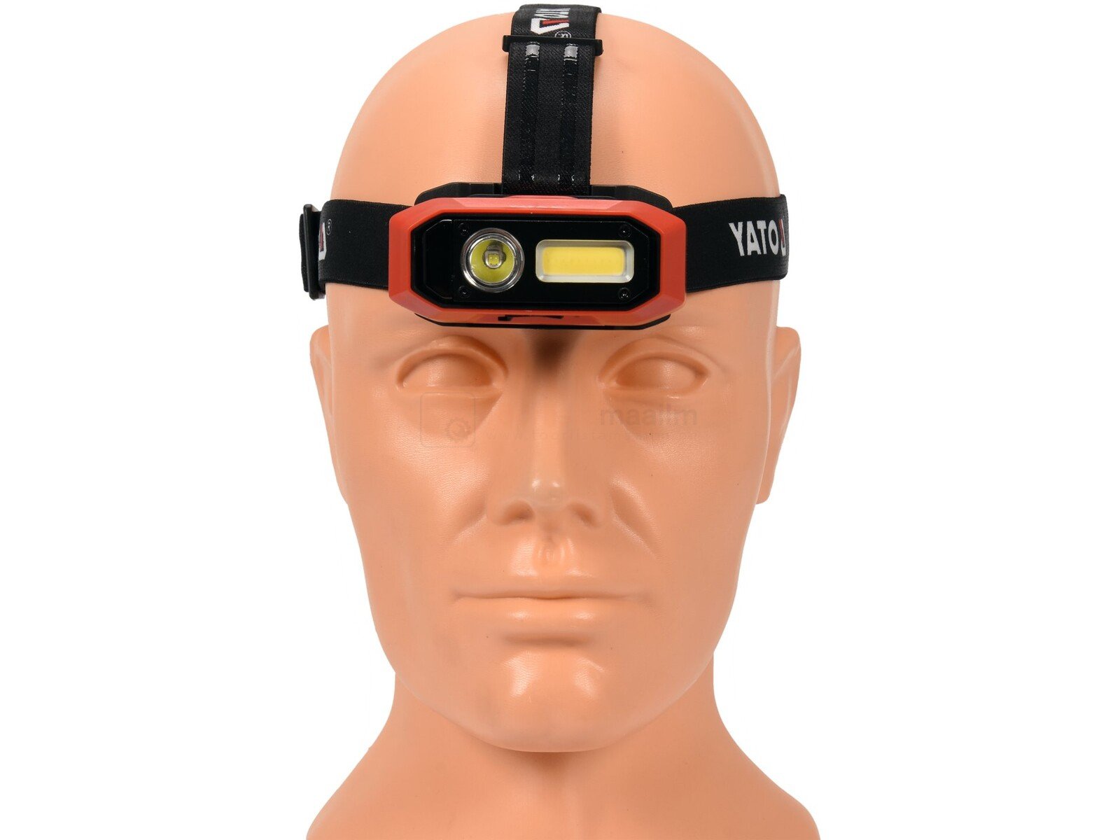 Pildil on mannekeeni peas Yato pealamp, millel on laetav funktsioon ja liikumisandur.