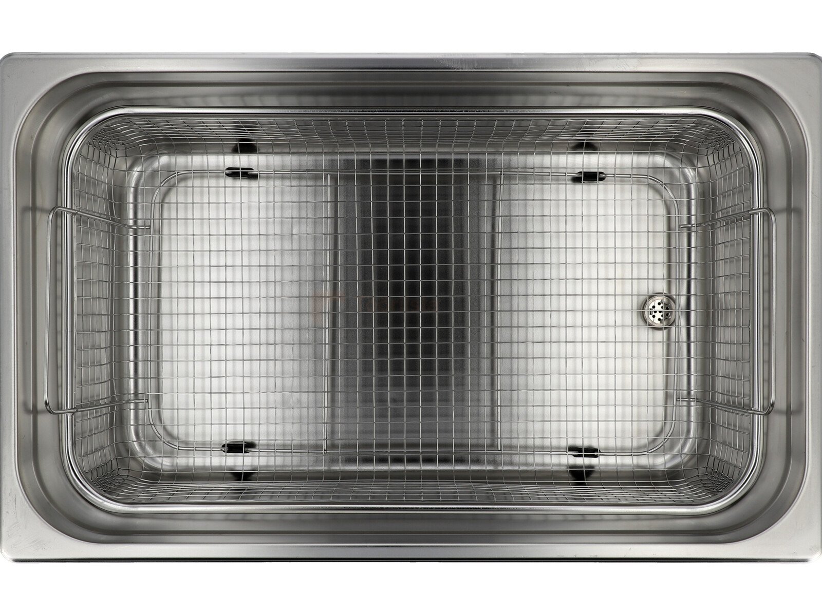 Pildil on ülevalt vaade YATO 22-liitrisele ultrahelipesurile, mille sees on metallist korv.