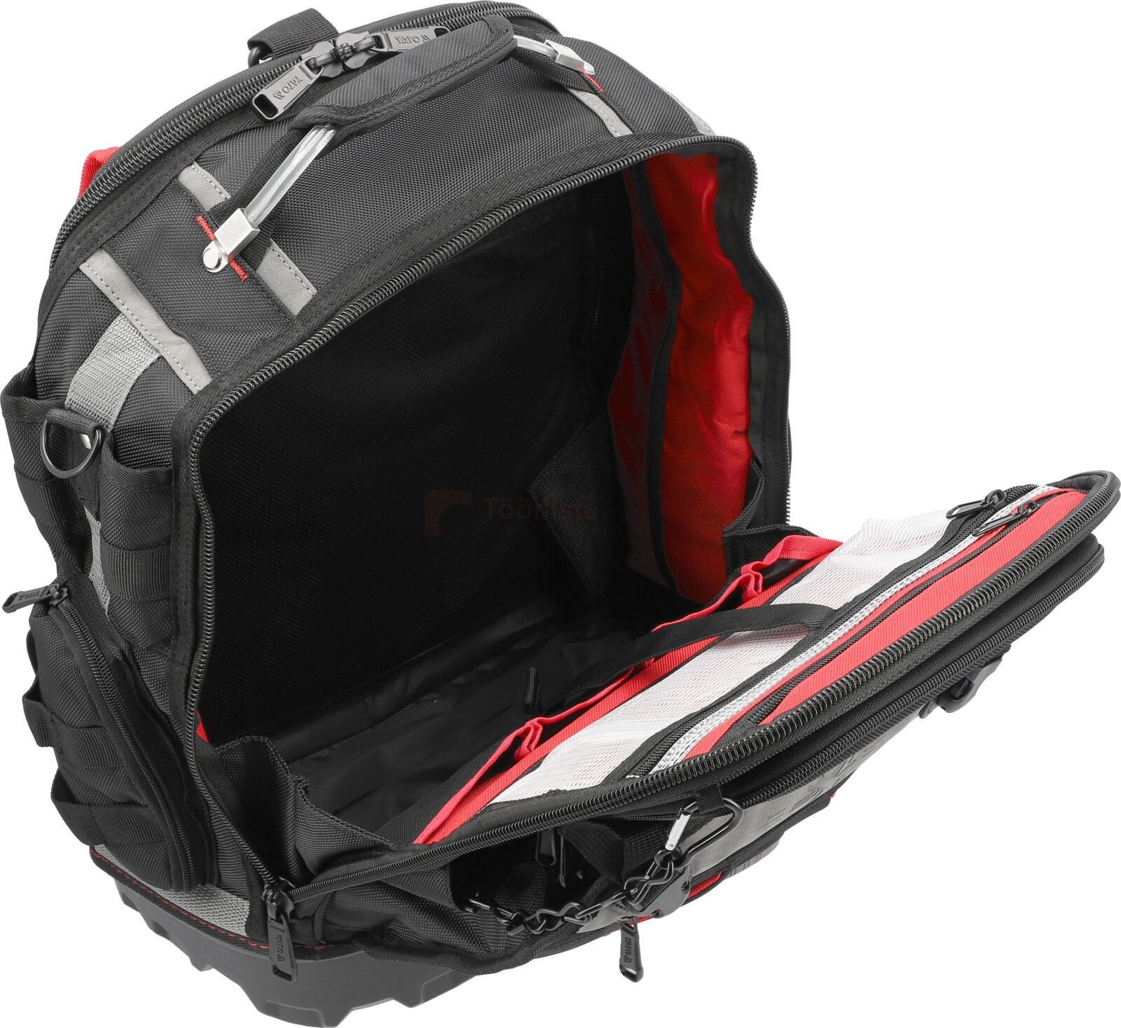 Pildil on avatud Yato seljakott, millel on näha palju taskuid ja punaseid detaile.