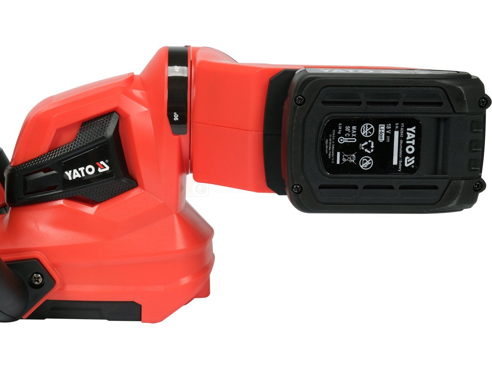 Pildil on näha Yato 18V 55CM - 2AH hekilõikuri küljeosa, millel on küljes aku.