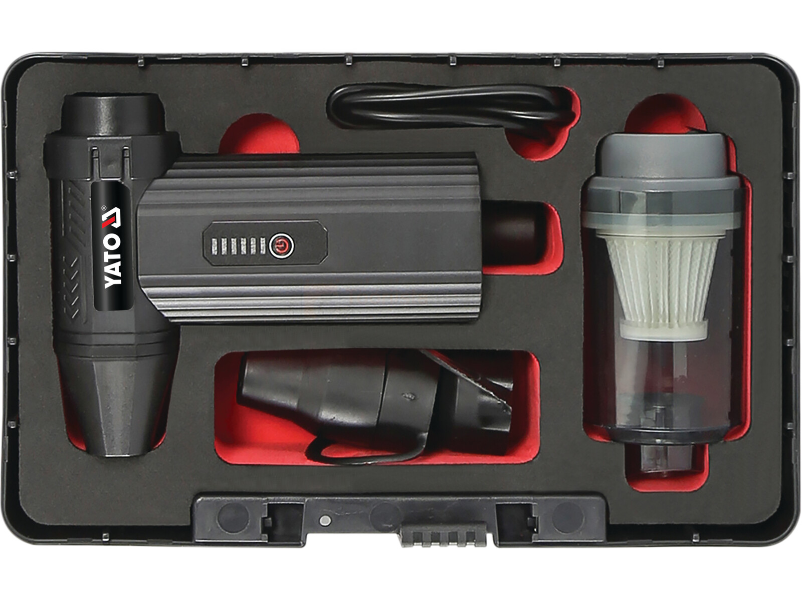 Pildil on YATO akutoitel puhur ja vaakumpuhastaja koos tarvikutega, mis on paigutatud musta kohvrisse.