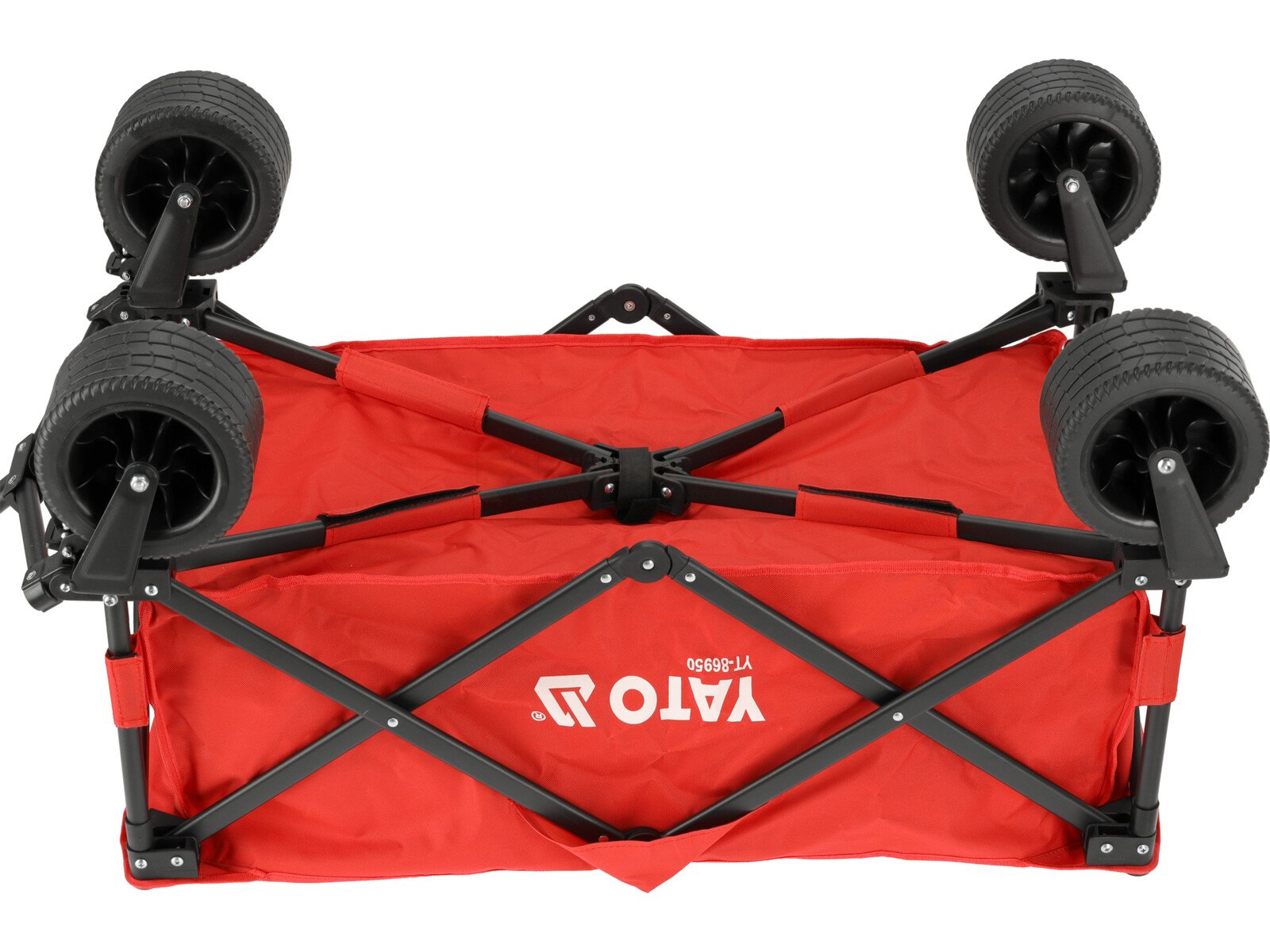 Pildil on punane Yato kokkupandav aia- ja matkakäru, mille rattad on ülespoole.