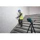 Pildil on Bosch joonlaser GLL 20-22 G, mis projitseerib rohelisi laserjooni.