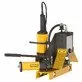 Pildil on kollane ja must REMS Collum, elektriline rullnuut, mis on mõeldud torude rullimiseks.