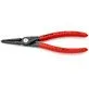 Pildil on Knipex täppistangid sisemistele stopperrõngastele, millel on punased käepidemed ja mustad otsad.