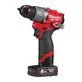 Pildil on Milwaukee M12 FPD2-602X akulööktrell, millel on punane ja must korpus ning must aku.
