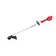 Pildil on näha punane ja must Milwaukee M18 FGTR-802 akutrimmer.