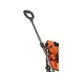 Pildil on FLO kokkupandava aia- ja matkakäru käepide ja oranž kangas, mis viitab käru korvile.