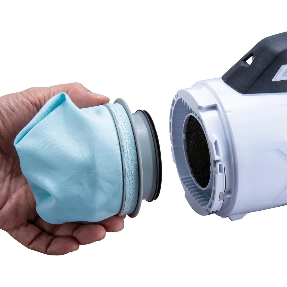 Makita aku varstolmuimeja CL003GD203 pildil on näha seadme käepideme osa, millel on aku laetuse indikaator, "MODE" nupp...