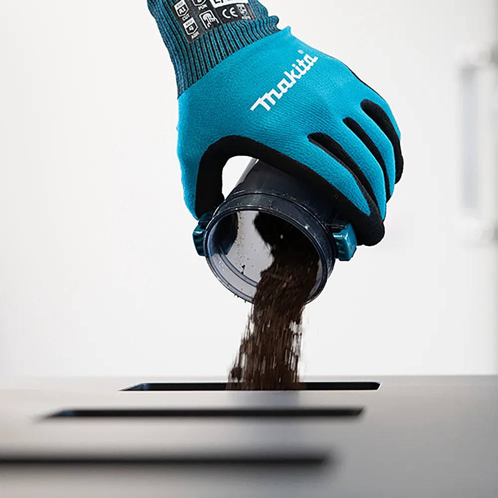 Pildil on näha Makita aku varstolmuimeja CL004GD101, XGT osa ja selle külge kinnitatud tolmukonteiner.