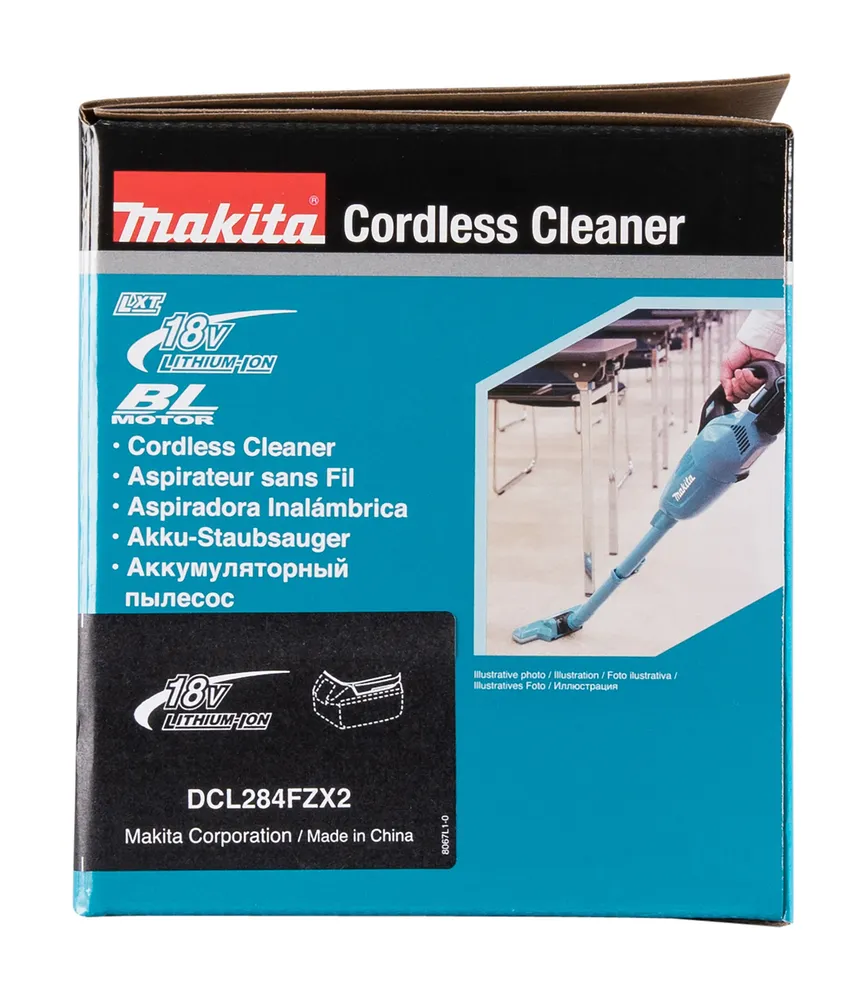 Pildil on Makita aku varstolmuimeja DCL284FZX2 karp, millel on näha toote pilt, kirjeldused ja tehnilised andmed.