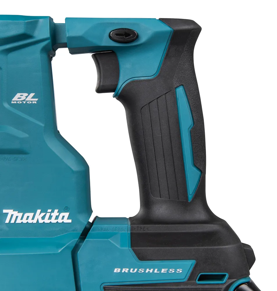 Pildil on näha Makita akupuurvasara DHR183Z detail, sealhulgas selle käepide ja mootori korpus.