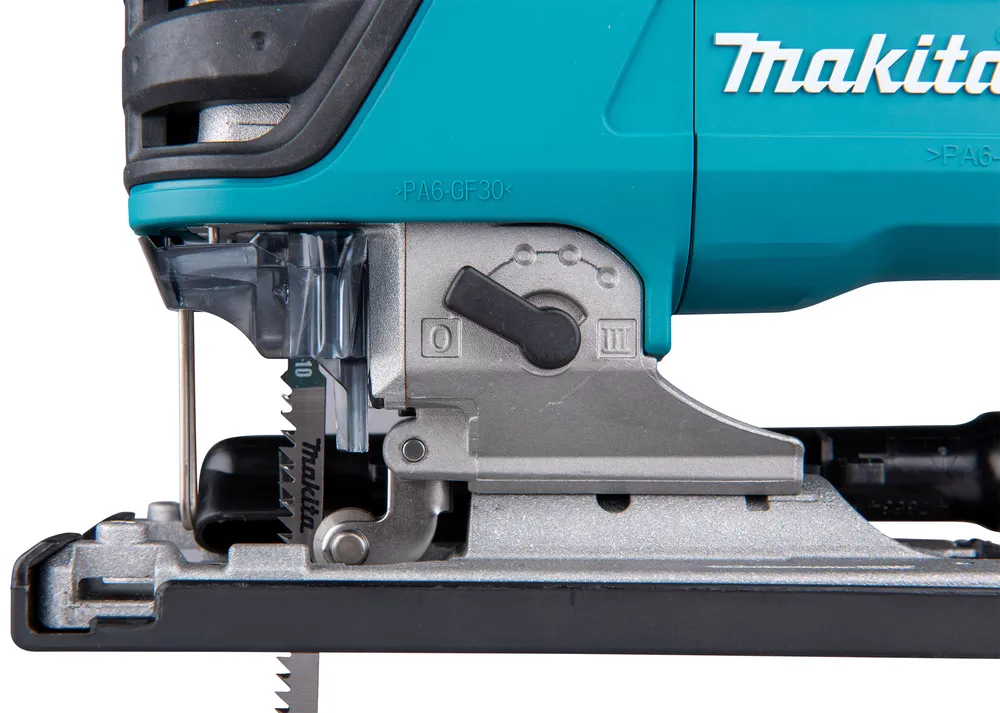 Pildil on näha Makita DJV180Z akutrelli detailne lähivõte, mis kujutab tööriista terast, lõiketera ja kiiruse seadistusnuppu.