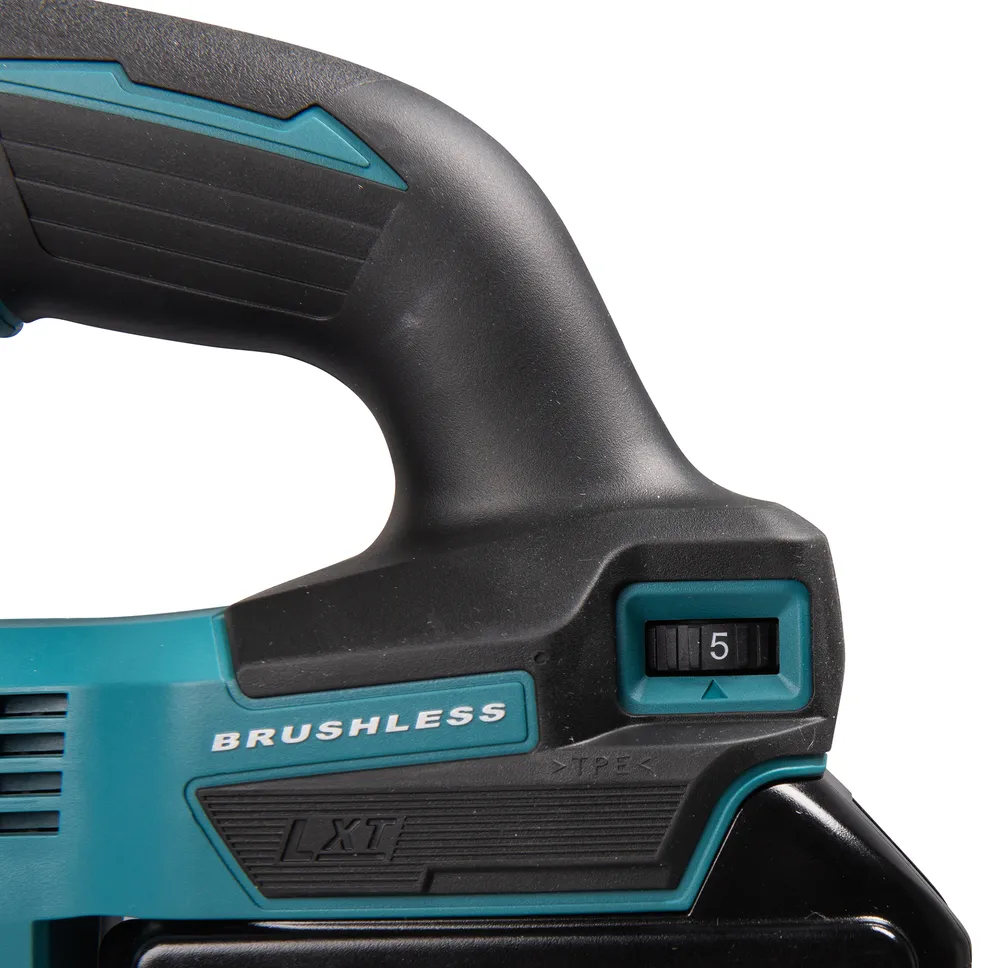 Pildil on Makita DJV184Z akutallsae käepide, millel on näha kiiruse reguleerimise nupp numbriga "5".