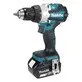 Pildil on Makita DLX2527TJ combokit, mis sisaldab akutrelli, millel on näha aku, käepide ja puuripea.