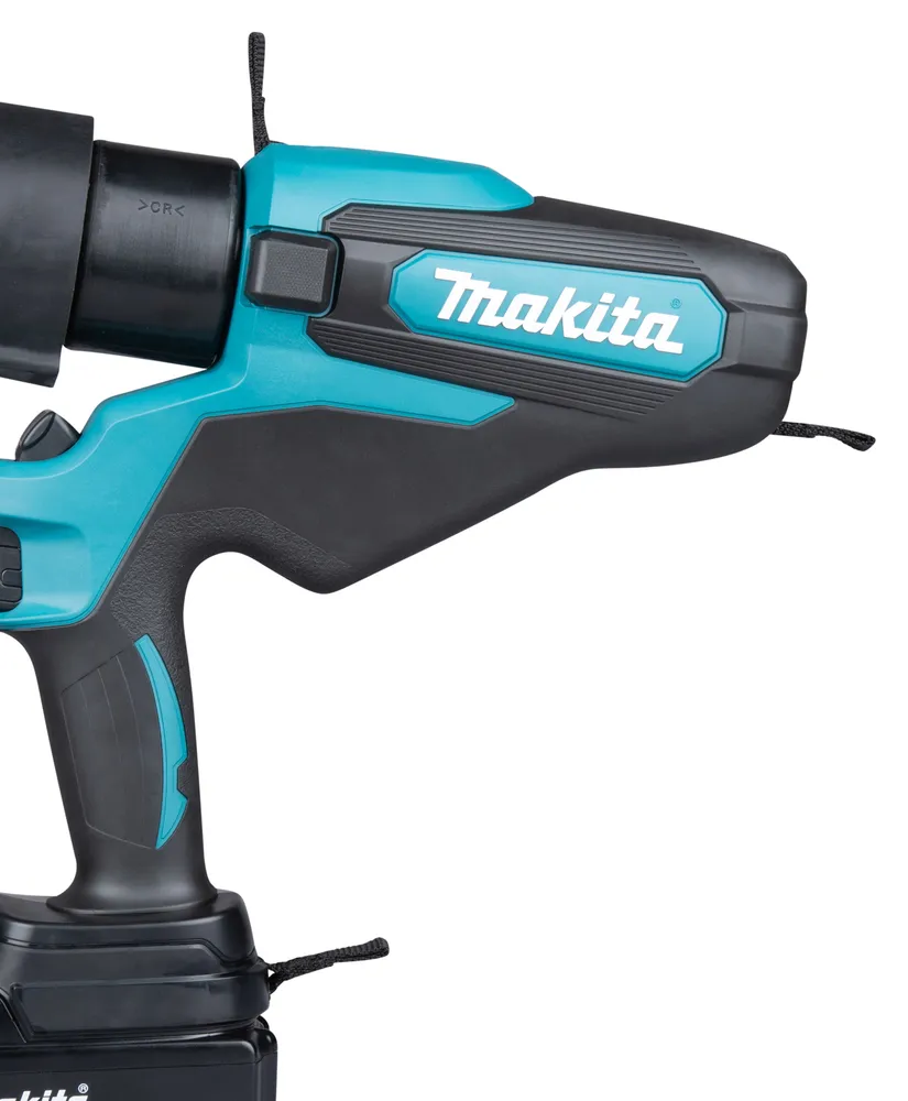 Pildil on detail Makita akukaablipressi DTC302ZK korpusest, nähtavad on ava koos sulguriga ja suunamisnooltega.