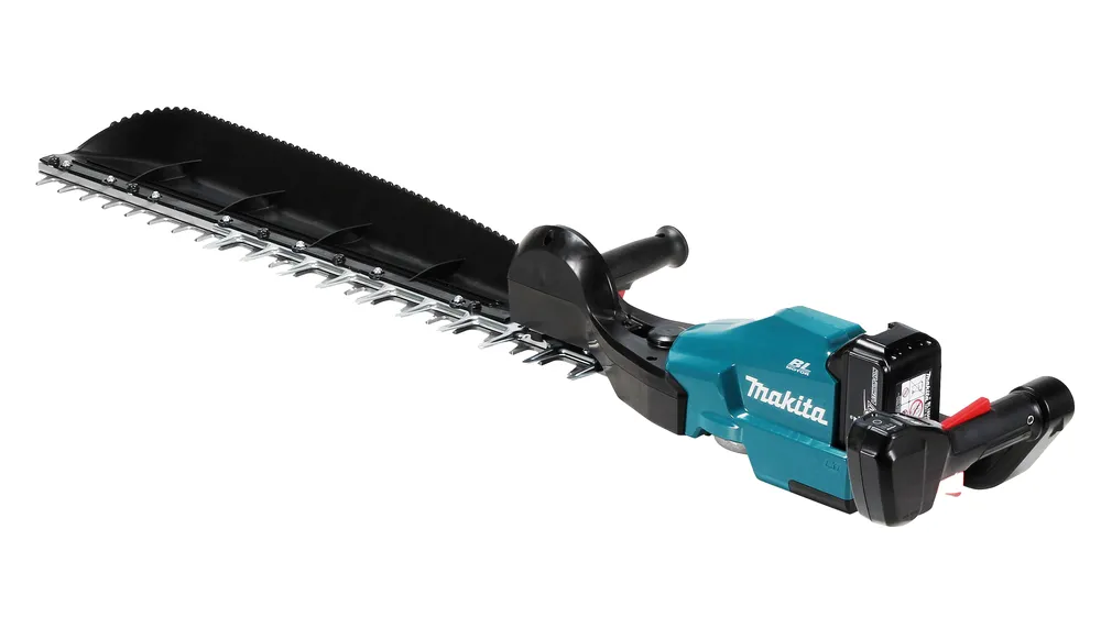 Pildil on Makita akuhekilõikur DUH754SZ, mis sisaldab terasid, kaitsekilpi ja kahte käepidet.