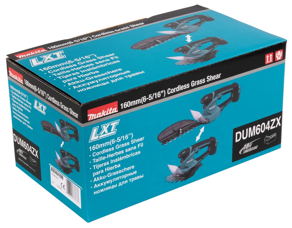 Pildil on näha Makita akuga murukäärid DUM604ZX, ilma aku ja laadijata, mis on pakendatud sinise karbi sisse.