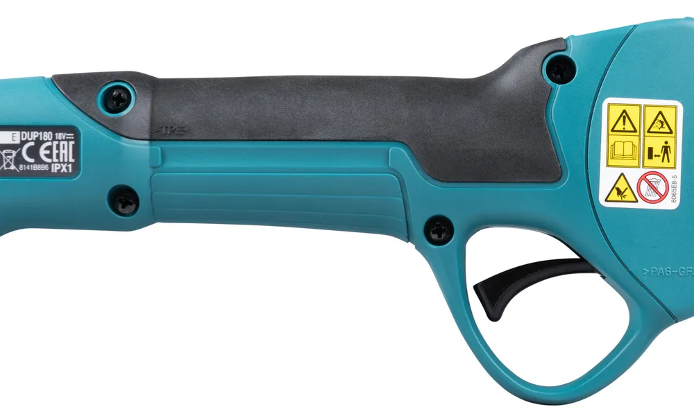 Pildil on Makita akuga oksakääride DUP180Z pealmine osa, kus on näha sisse/välja lüliti ja pihustusrežiimi nupp.