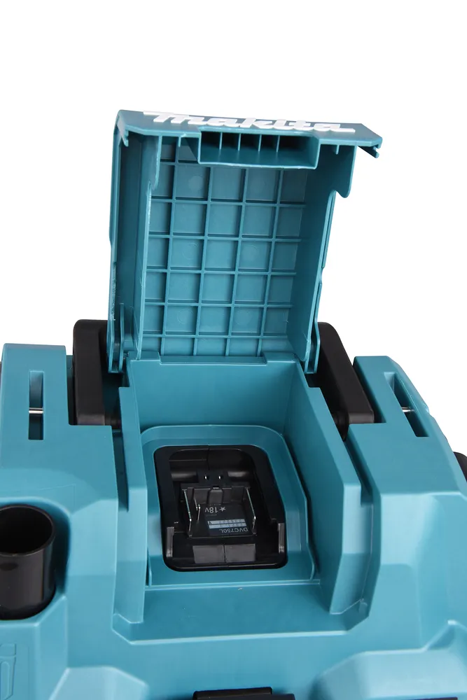 Pildil on Makita akuga vee- ja tolmuimeja DVC750LZ avatud kaanega ja näha on akuhoidik.