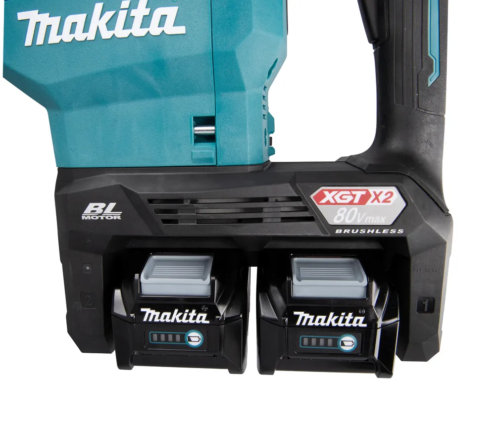 Pildil on näha Makita akupiikvasara HM002GZ03 alumine osa, millel on kaks akupesa ning XGT X2 ja BL mootori logod.