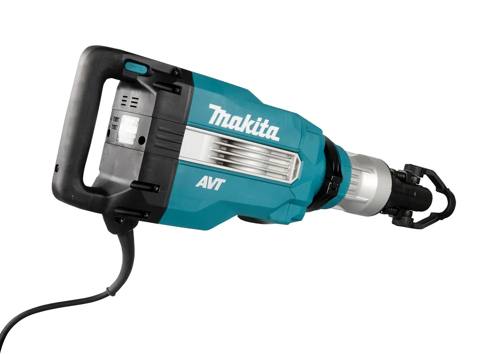 Pildil on Makita piikvasar HM1512, millel on turvakäepide ja toitejuhe.