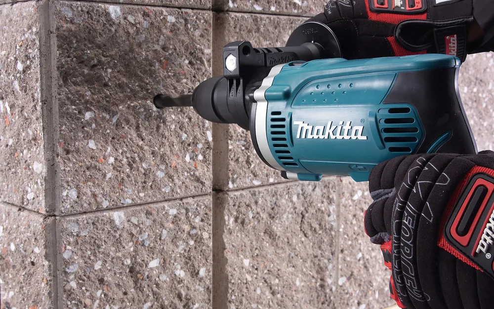 Makita ударная дрель HP1631