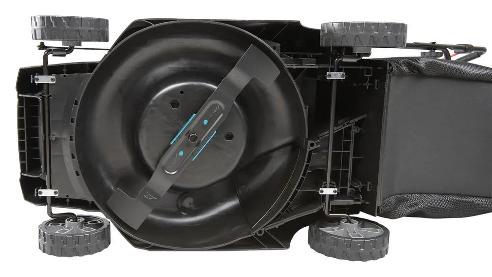Makita akumuruniiduk LM004GM103, XGT, pildil on näha selle teraga ja kogumiskotiga alumine osa.