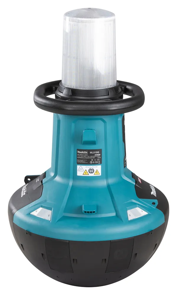 Pildil on Makita akulamp ML010G, millel on sinine ja must korpus ning läbipaistev lambikuppel.