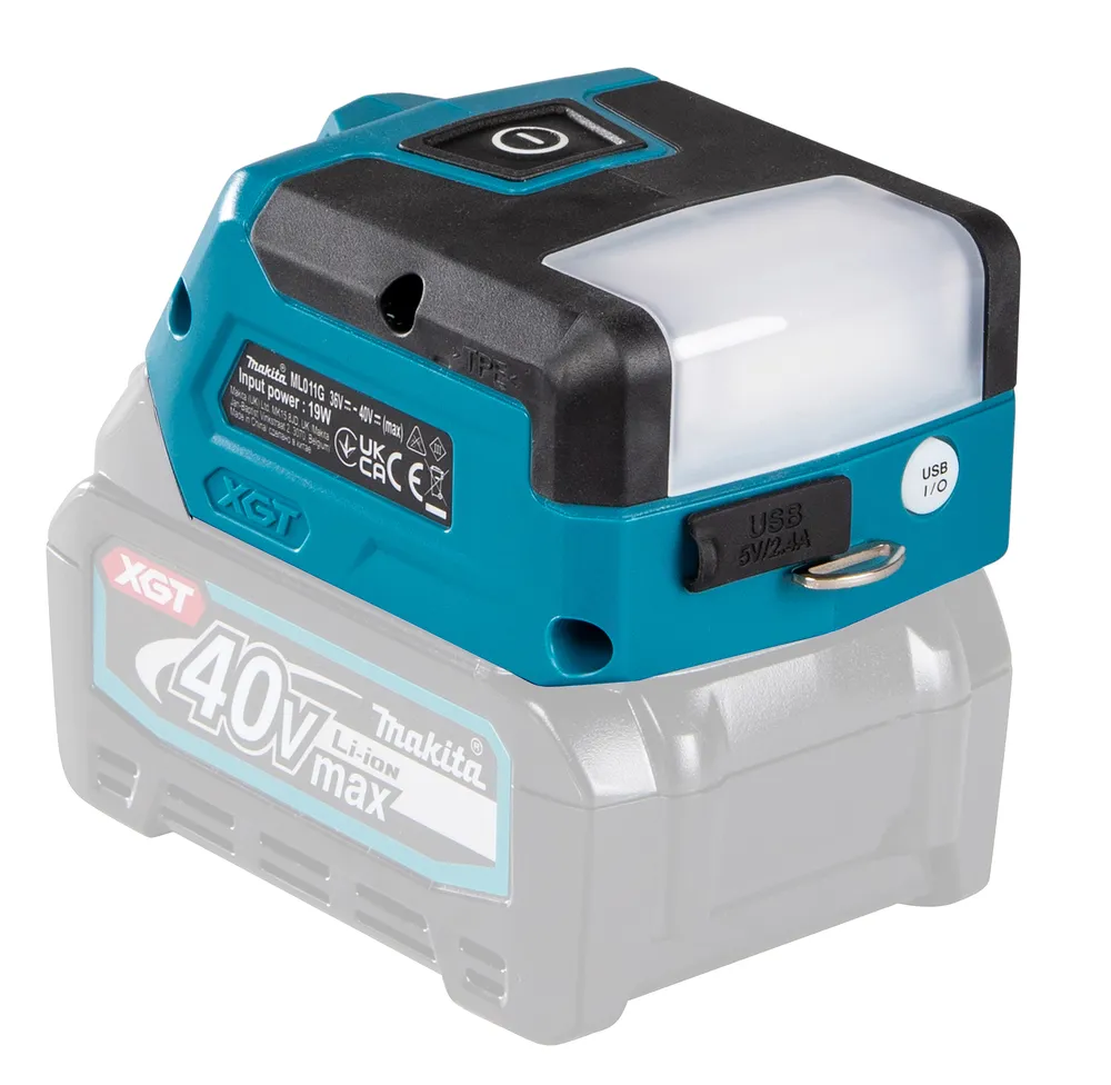 Pildil on Makita akulamp ML011G, mis on paigutatud tühjale akupakile.