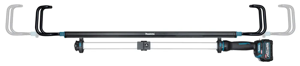 Pildil on Makita akulambi ML012G detail, mis näitab selle kinnitusmehhanismi ja viitab võimalusele seda üles riputada.