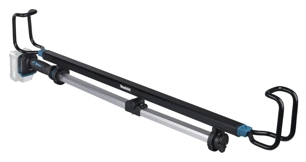 Pildil on Makita akulamp ML012G, mida hoiavad üleval mustad metallist konksud.