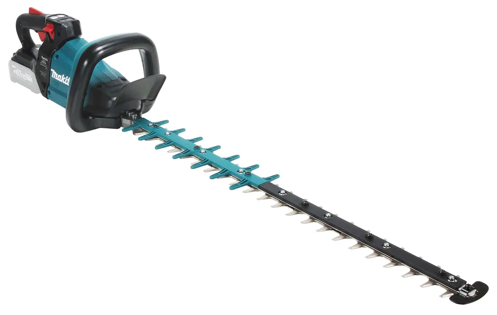 Pildil on Makita akuhekilõikur UH005GZ, XGT, nähtav detailidega, sealhulgas lõiketerad, käepide ja aku.
