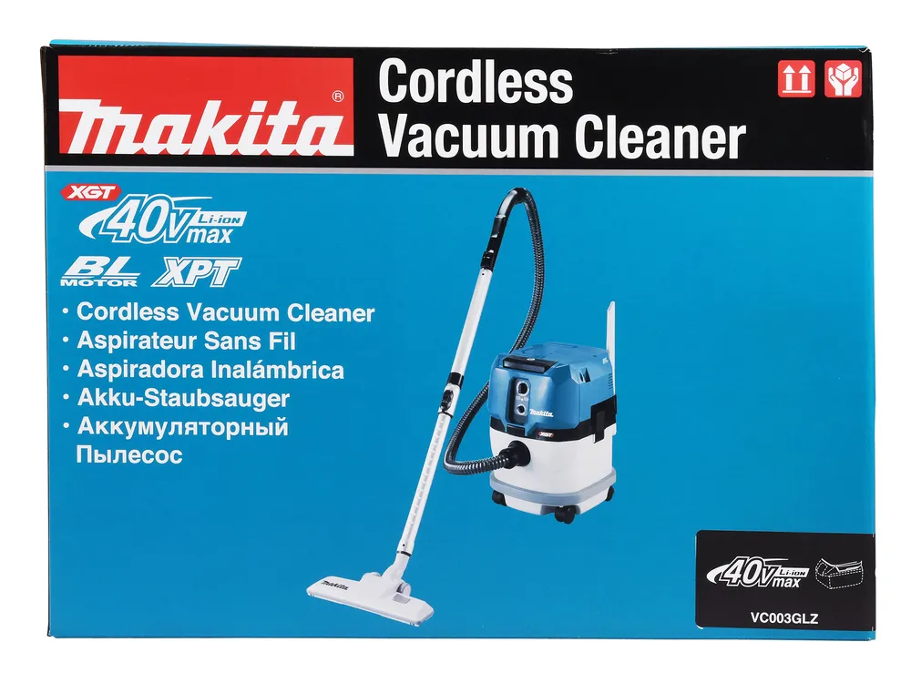 Pildil on Makita akuga vee- ja tolmuimeja VC003GLZ karp, millel on toote kirjeldus erinevates keeltes ja pilt tolmuimejast.