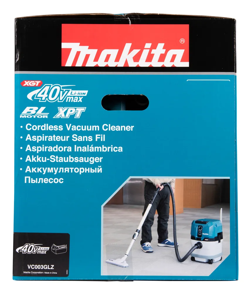 Pildil on Makita VC003GLZ akuga tolmuimeja pakend koos pildiga seadmest ja selle kasutajast.