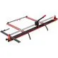 Pildil on Yato PROFESSIONAL TILE CUTTER 1650 MM, mis on punane ja must plaatide lõikur, millel on pikad juhikud ja käepide.